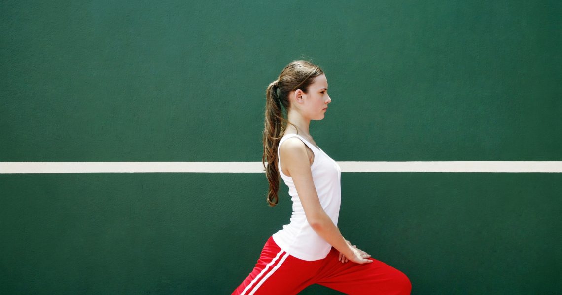 vrouw warming up ook met TENS mogelijk